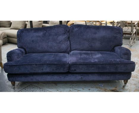 HOWARD STYLE SOFA, navy blue chenille on chrome front castors, 87cm H x 204cm W x 110cm D. 