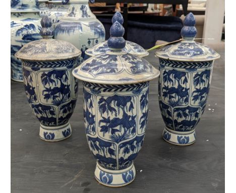 JARS WITH COVERS, a set of four, Chinese export style, blue and white ceramic, 32cm H. (4) 