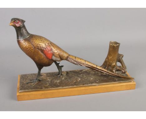 A cold painted spelter table lighter formed as a pheasant.  