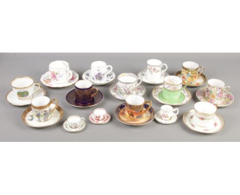 Fifteen bone china cups and saucers. Includes Royal Crown Derby, Soho Pottery Ltd, Noritake, Coalport etc.  