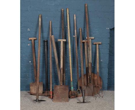 A collection of vintage garden/agricultural tools. To include shovels, cultivators, pitchfork, hoe etc.  
