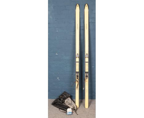 A pair of vintage Kneissl 'White Star' skis, in carry bag with label attached for the 'Earl of Liverpool', Rutland. 209cm lon