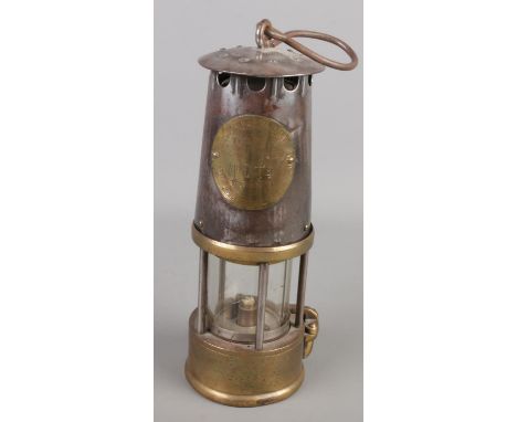A Protector Lamp &amp; Lighting Co Ltd miners Lamp. Type SL No 174.  