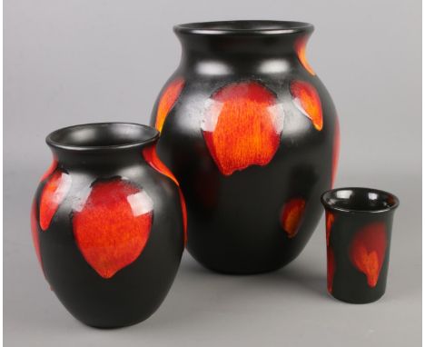 Three pieces of Poole pottery in the Cosmic Drip lava pattern. Large vase 25cm.  