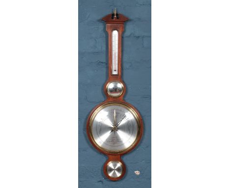 A Howard Miller banjo barometer.  