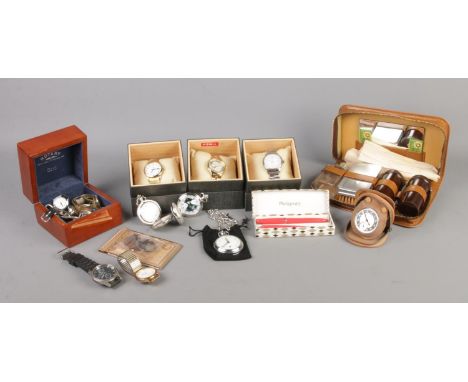 A box of assorted collectables, to include three boxed Timex quartz wristwatches, other assorted wristwatches and unused and 
