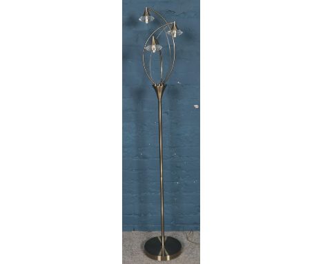 A chrome standard lamp.  