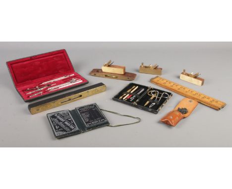 A quantity of collectable tools and utility items, to include boxwood extendable ruler, vintage maths set, sewing case and mi