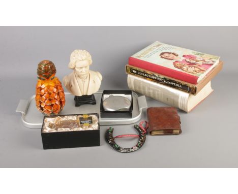 A quantity of collectables including Beethoven bust, playing cards in leather case, flask and books.  