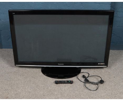 A Panasonic 50" Viera TV. Model TP-P50510B. With remote and power cable.  