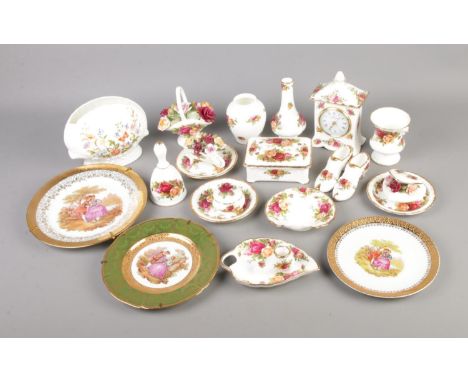 A quantity of mainly Royal Albert Old Country Roses to include quartz clock, bell, posy vase etc. Also includes Aynsley Cotta