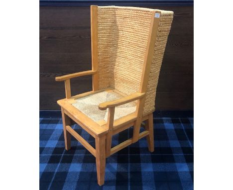 20TH CENTURY LIGHT OAK FRAMED ORKNEY CHAIR, the curved woven straw back flanked by open arm rests, frop-in seat, on square ta