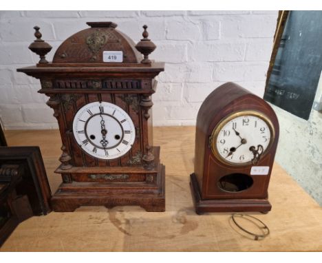 An oak bracket clock and an inlaid mahogany mantle clock (both as found).  