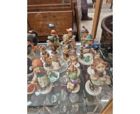 12 figures by Hummel/Goebel including Little Cellist and CinderellaCondition:- Good, no sign of any damage or repair. Height 
