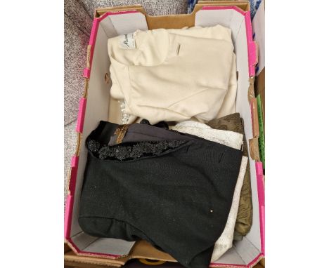 A box of women's 1950s and 60s vintage jackets
