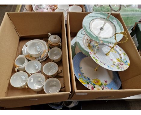 A Japanese tea set together with a Wedgewood cake stand and a Katie Alice cake stand.  