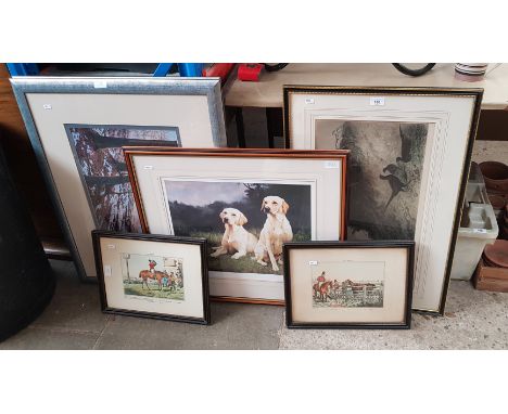 Various pictures and prints, mostly hunting and shooting related.