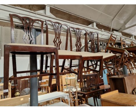 A set of four Chippendale style mahogany dining chairs.  