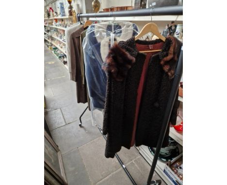 A clothes rail of vintage women's 50's &amp; 60's clothing with jackets including Centaur,2&nbsp; ladies raincoats, 2 ladies 