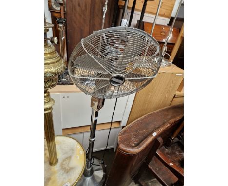 A vintage Cinni chrome floor standing fan.  