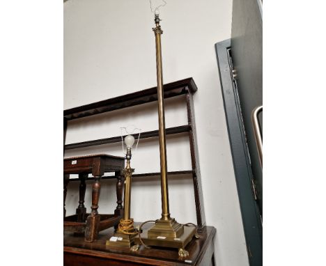 A brass table lamp and a brass standard lamp modelled as Corinthian columns.Both lamps worked when tested