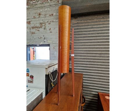 A mid 20th century teak rocket lamp, height 112.5cm.