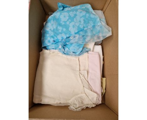 A box of women's 1950s and 60s vintage blouses