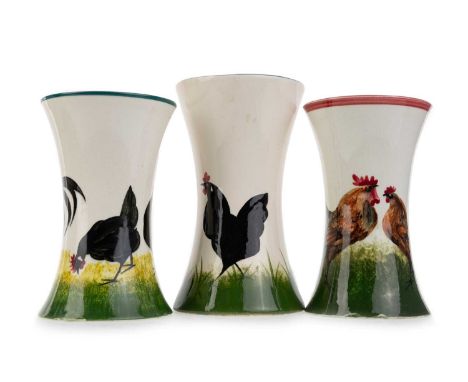 WEMYSS, THREE BEAKER VASES, comprising one decorated with black cockerels, with impressed Wemyss mark and stamped retailer ma