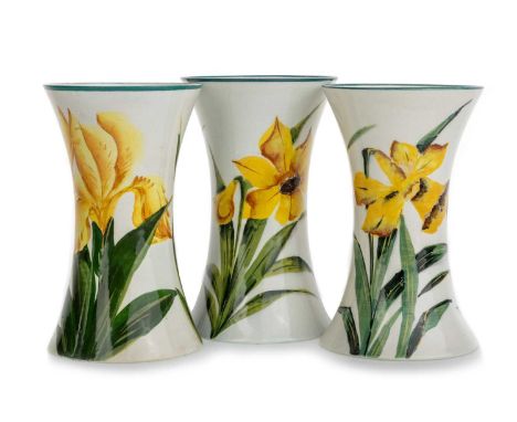 WEMYSS, THREE BEAKER VASES, each hand painted with yellow flowers, with impressed marks to basethe largest 16.5cm highQty: 3V