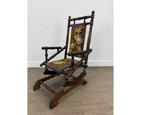 VICTORIAN CHILD SIZE BOBBIN ROCKING CHAIR, with studded tapestry seat and back74cm high