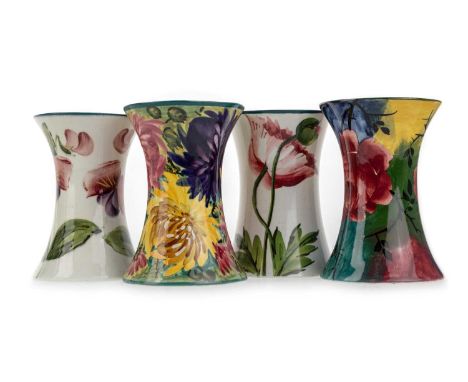 WEMYSS, FOUR BEAKER VASES, each hand painted, two in the "Jazzy" pattern, with hand signed Wemyss marks, and two with pink an