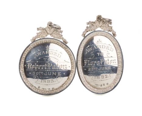 TWO VICTORIAN SILVER SCHOOL DUX MEDALS, 1892 AND 1893 one awarded to Flora Paton, Ardrossan No.2 public school, in original f