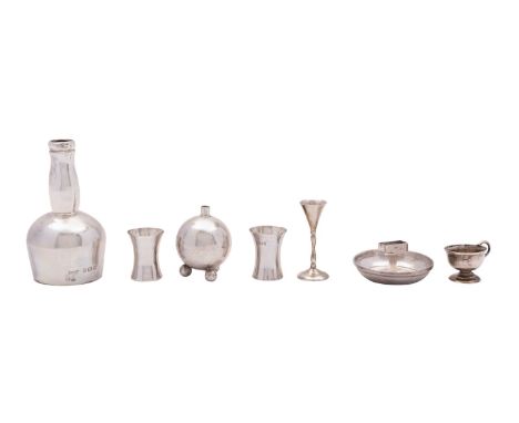 A collection of vintage silver dolls house tableware, various dates and makers, to include a cigar table lighter, a silver go