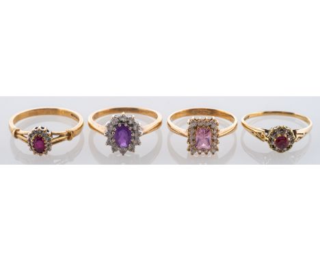 Four gemset cluster rings, including two 9ct gold, ruby rings, a 9ct gold, pink gemstone ring and a purple paste ring, stampe