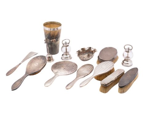 A mixed group of silver to include: an Indian silver oval bowl of lobbed form, a silver and silver plated table bell, a selec