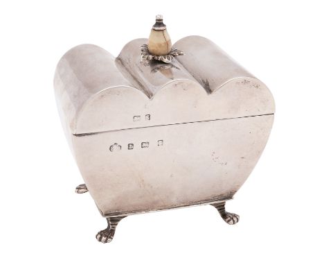 A George V silver tea caddy, Elkington and Co Ltd, Birmingham 1902, of casket form with wavy dome lid, bone finial, raised on