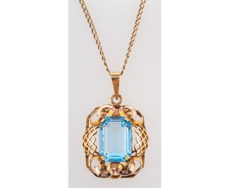 An octagonal, step-cut blue paste pendant, stamped '585', and a curb-link chain marked '15CT', length of pendant (exl jump ri