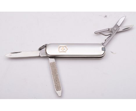 Victorinox for Tiffany & Co. A silver Classic SD Penknife, stamped 'Tiffany & Co' and '925 750', in a Tiffany & Co box.