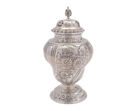 A Victorian silver sugar caster and cover, maker's mark rubbed possibly Gibson and Longman, London 1898, the acanthus leaf fi