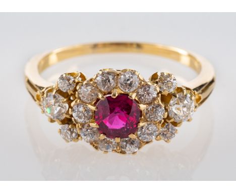 A cushion-cut ruby and old-cut diamond cluster ring, estimated ruby weight ca. 0.70ct, total estimated diamond weight ca. 0.9