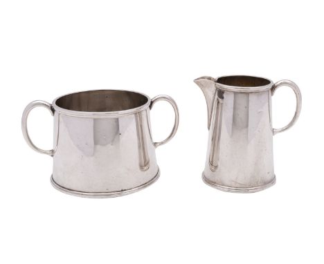 A George IV silver sugar basin and cream jug, Albert Faulkner, Sheffield 1916  of plain form, jug 7.5cm high, 265 grams, (2).