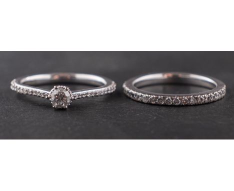 Two 18ct gold and diamond rings designed by Jenny Packham, both signed, including a single-stone ring with highlights to gall