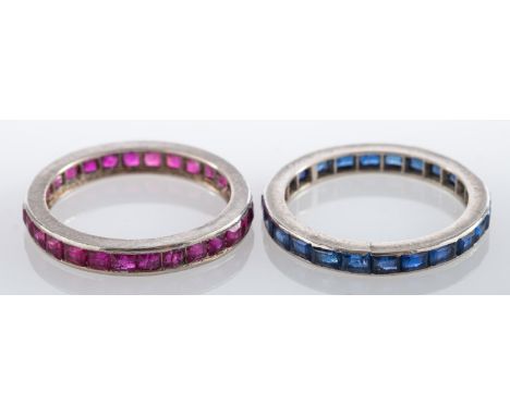 A sapphire eternity ring, set with rectangular cut sapphires, ring size J 1/2; and a synthetic ruby eternity ring, ring size 