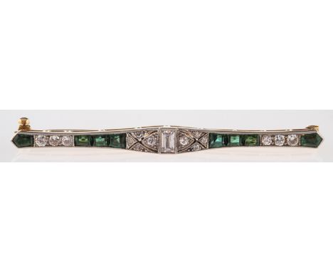 A diamond and  tourmaline bar brooch, millegrain set to the centre with  a rectangular step-cut diamond, with millegrain set 