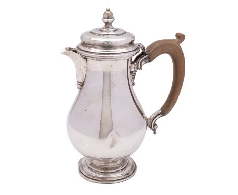 A George V silver hot water jug, Page, Keen & Page (Plymouth), London 1939, of baluster form, the acorn knop finial, domed hi