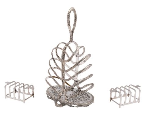 A pair of Art Deco silver toast racks, Mappin and Webb, Sheffield 1938, of square section, 10.5cm long together with a mid Vi
