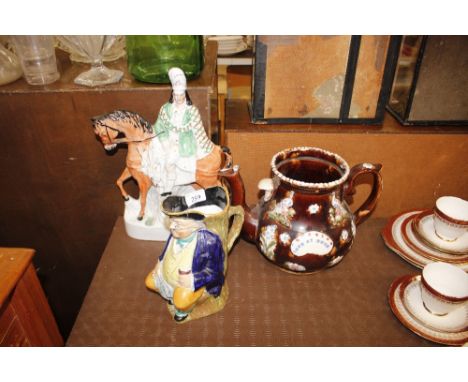 A Victorian bargeware teapot (lid Missing); a Staffordshire flat back figure AF; and a character jug 
