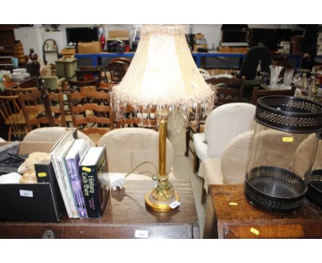 A gilt table lamp and shade 