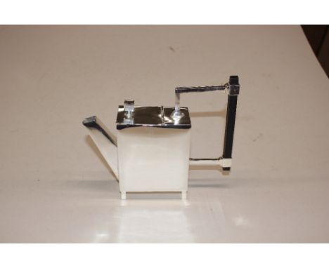 A plated teapot in the manner of Dr Christopher Dresser