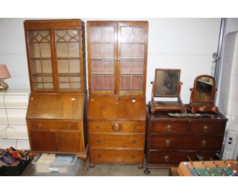 A light oak bureau bookcase, shelves enclosed by leaded glazed doors